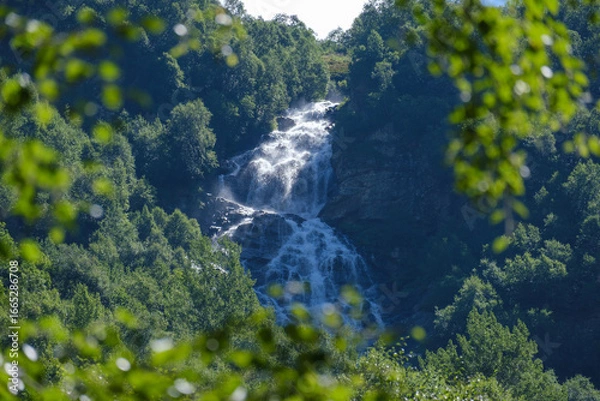Obraz magical mountain waterfall among greenery