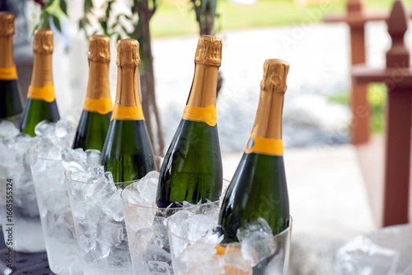 Fototapeta Champagne on ice and ready for the reception guests appropriate for the toasts