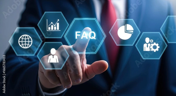 Fototapeta Businessman's finger touches the glowing FAQ icon amidst virtual business data icons on a screen