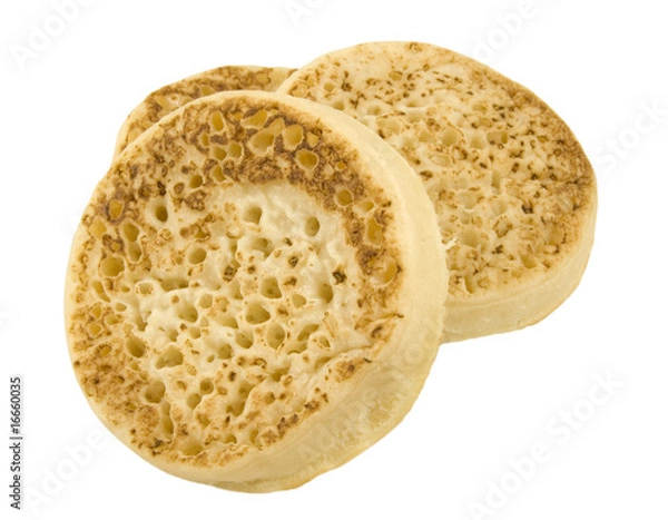 Fototapeta three stacked english muffins isolated on white background