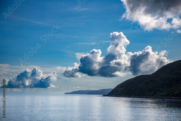 Obraz 爽やかな空気に包まれた早朝の夏の海。