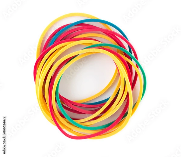 Fototapeta Pile of colorful rubber bands isolated on a white background