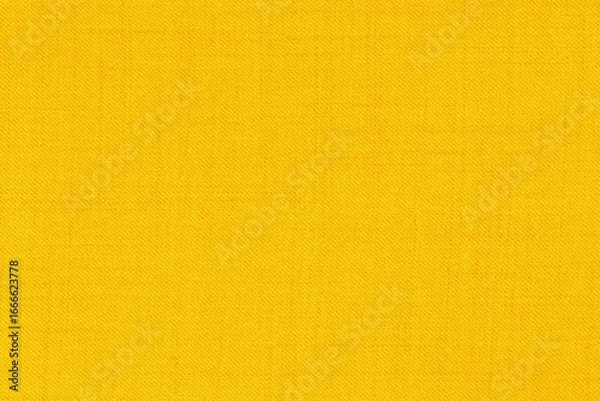 Fototapeta Yellow golden linen fabric cloth texture for background, natural textile pattern.