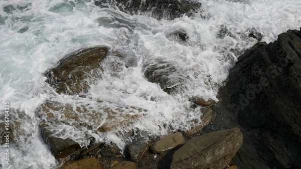 Fototapeta Waves on the rock