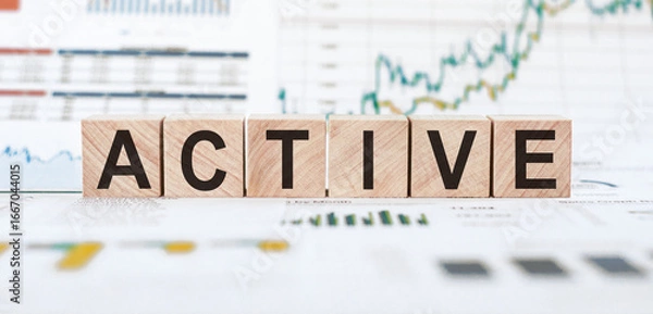 Fototapeta Wooden Blocks Spelling Active on Financial Charts