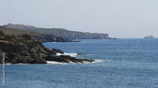 Fototapeta Waves against rocks