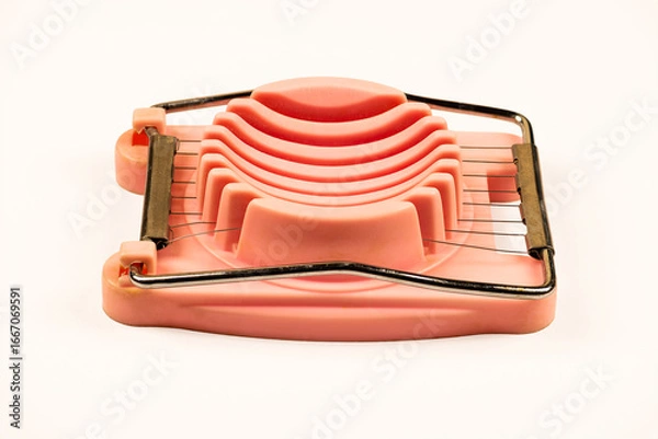 Obraz Vintage Pink Egg Slicer on White Background
