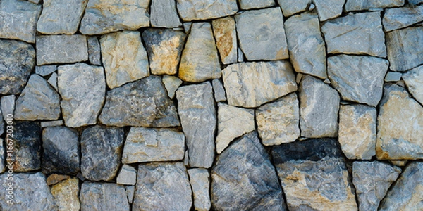 Obraz Gray stone wall texture background,dry stone wall
