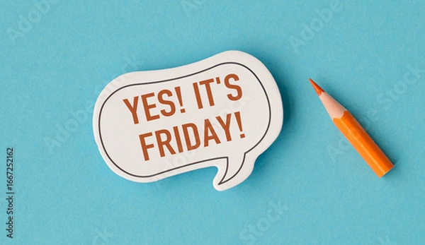 Fototapeta A yellow pencil is on a blue background with a white sticker that says Yes It's Friday