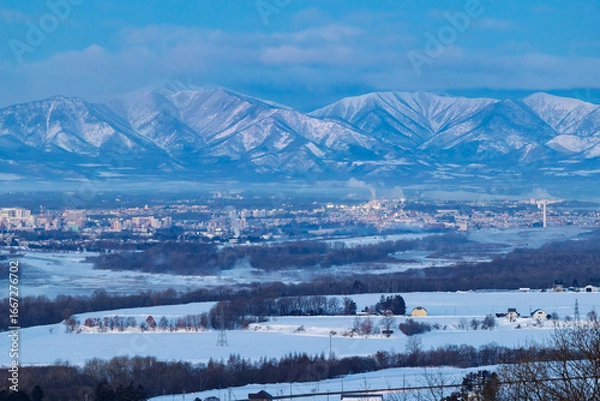 Fototapeta 朝焼けと日高山脈