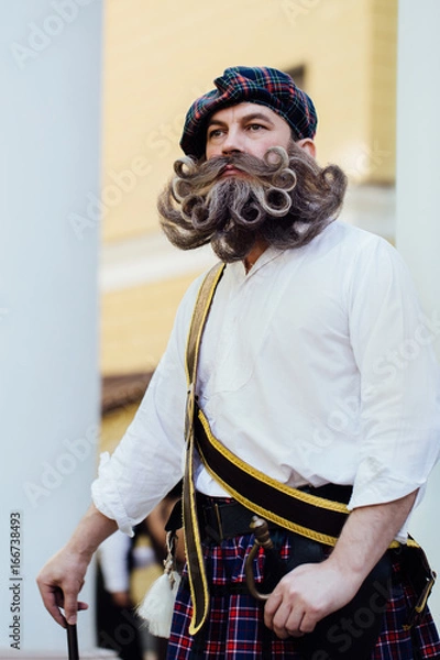 Obraz Handsome portrait of a brave Scot with a amazing beard and mustache curls in the Hungarian style.