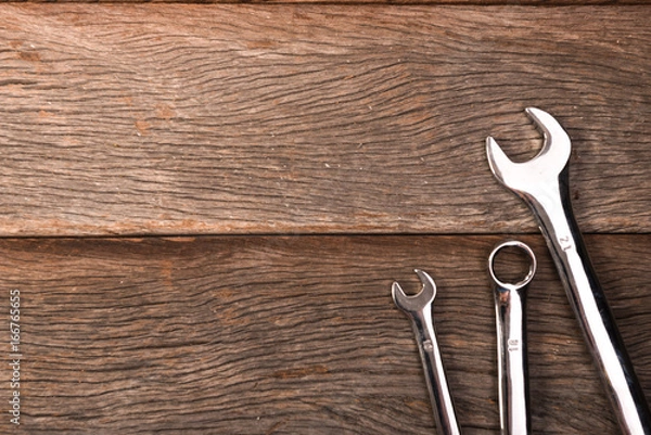 Obraz wrenches on wooden background