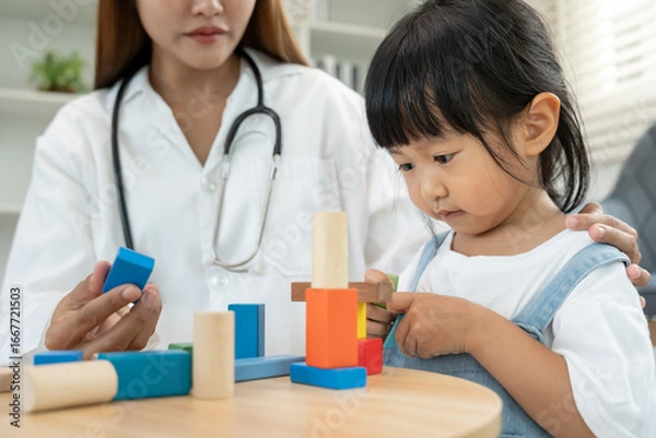 Fototapeta Pediatricians are checking the children development according to the appropriate age, doctors encourage the child to do activities, IQ, EQ, age appropriate learning activities and promotion, expect