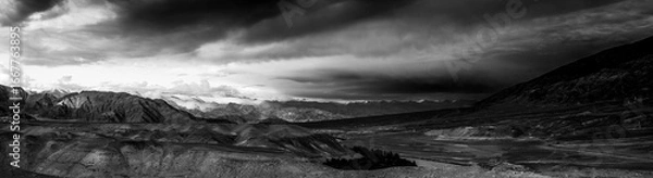 Fototapeta Scenic view of mountains against storm in Ladakh