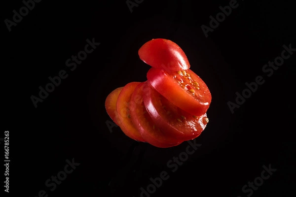 Obraz Tomato slime black background