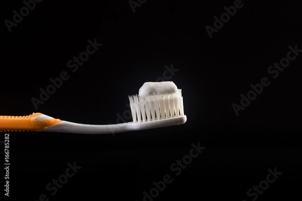 Obraz toothbrush black background