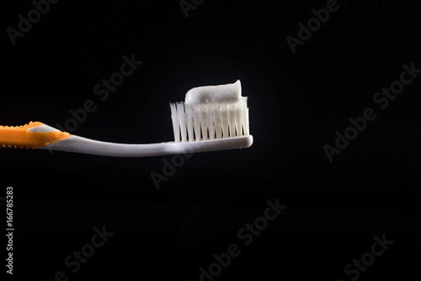Obraz toothbrush black background