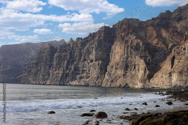 Fototapeta Panoramic view of the huge rock cliffs of Los Gigantes in Tenerife, Canary Islands, Spain.