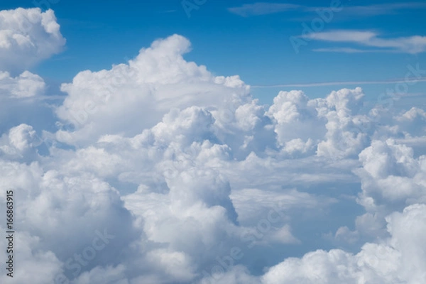 Obraz White clouds and bright sky