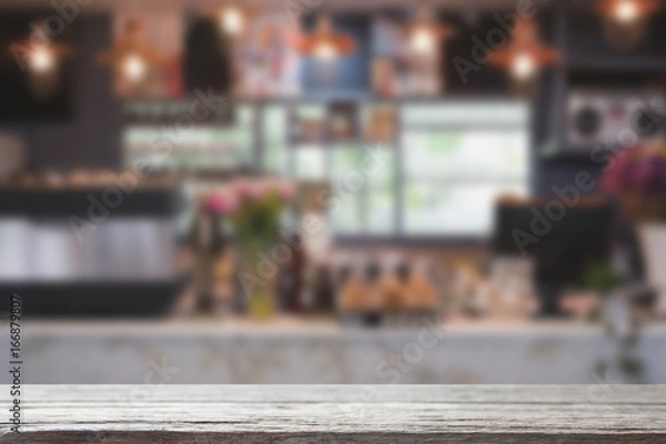 Fototapeta bar in cafe, counter in coffeeshop, restaurant interior with wood table for montage or display your product