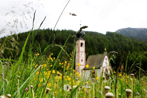 Fototapeta Church of St. Magdalena, near the Cinque Torri mountain peak in Dolomiti of the Alps in Italy
