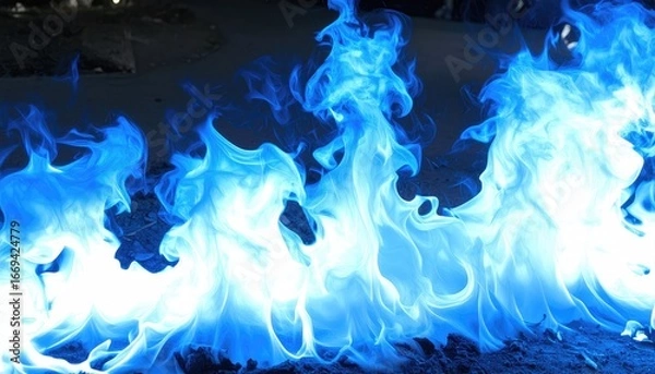 Obraz Vivid blue flames dance and swirl in a mesmerizing display of fire.