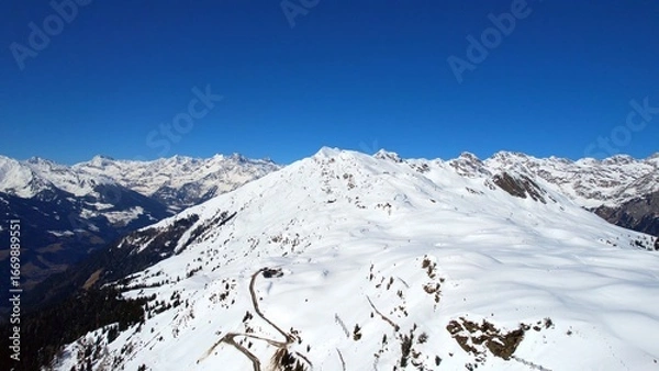 Obraz Jaufenpass, South Tyrol - Italy - Aerial view of snow-covered mountains with ski resort