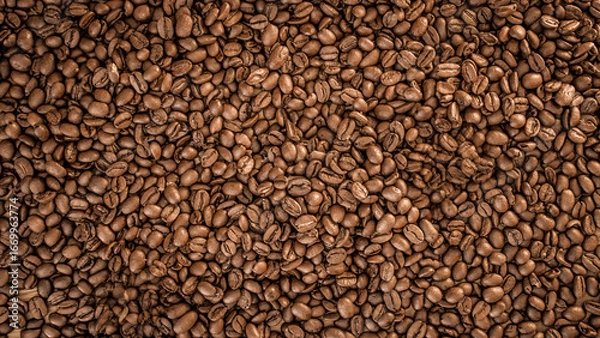 Fototapeta coffee, grain, beans, scattered, background, structure, wallpaper, pattern, real photo, brown, roasted, aromatic