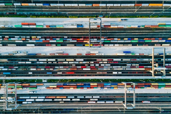 Fototapeta Cargo Trains and Containers at a Terminal