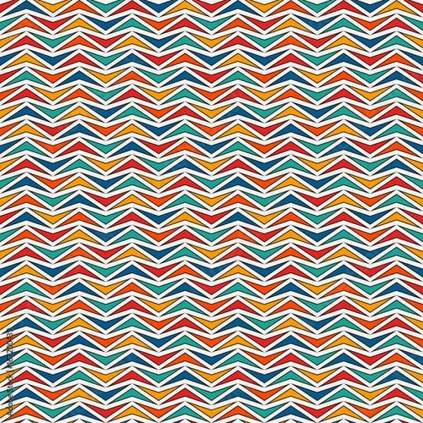 Fototapeta Bright colors seamless pattern with repeated stylized triangles mosaic. Zigzag abstract background. Vivid digital paper