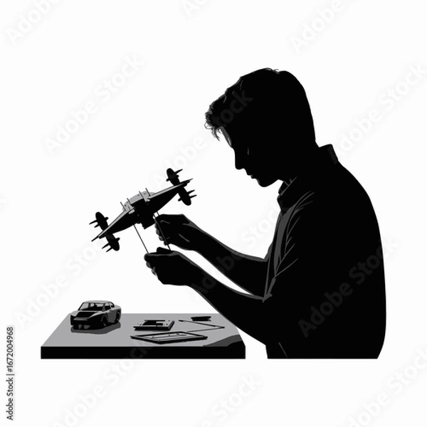 Obraz Model Building Enthusiast Working on Airplane Model