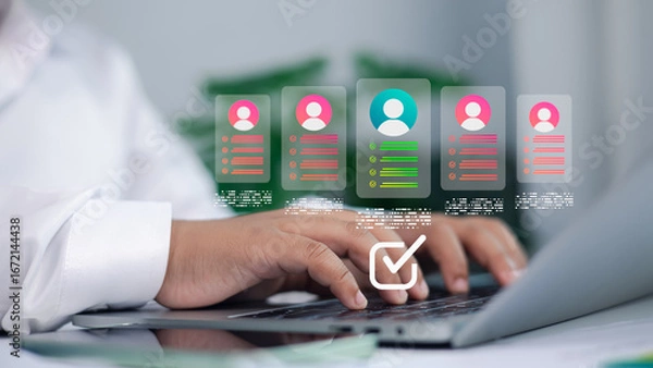 Fototapeta Human resources manager using laptop with digital candidate profile icons, online recruitment and HR technology concept for hiring and talent management