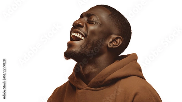 Obraz Side view of joyful Black man in brown hoodie laughing out loud, on transparent background