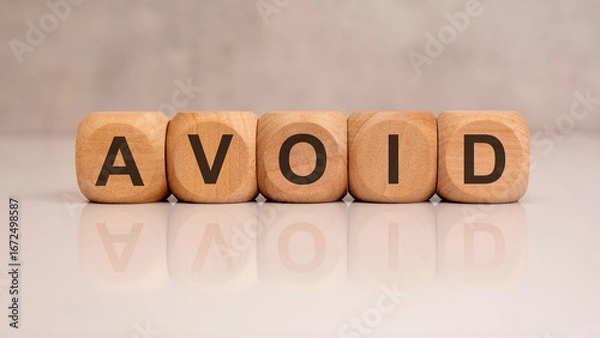 Fototapeta Wooden block with text avoid.