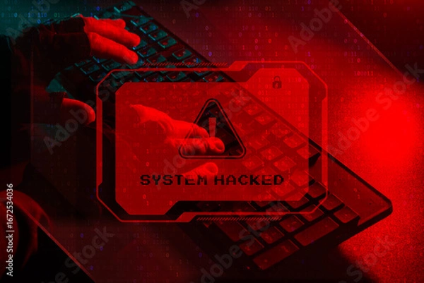 Fototapeta Cyber Attack system hacked concept. Hacker hands typing on a keyboard with a glowing red warning sign System HACKED.