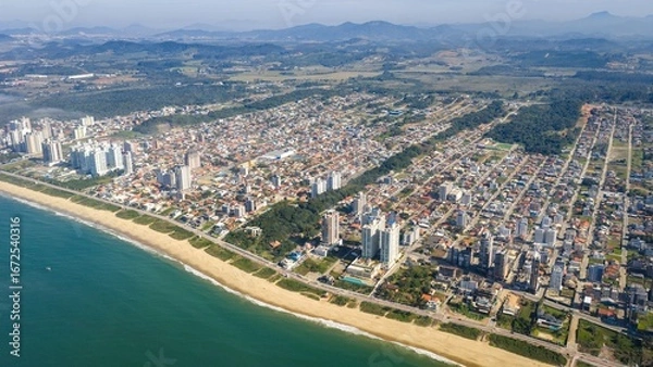 Obraz High aerial view of Balneário Piçarras coastline and urban grid.