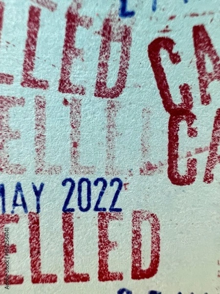 Fototapeta Stamped letters on old paper, date, month and year.