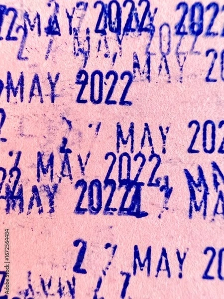 Fototapeta Stamped letters on old paper, date, month and year.