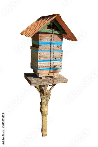 Fototapeta Photograph of a handmade wooden hive box for native bees. Sunny day. Concept of biodiversity preservation and ecology. Essential pollinators.