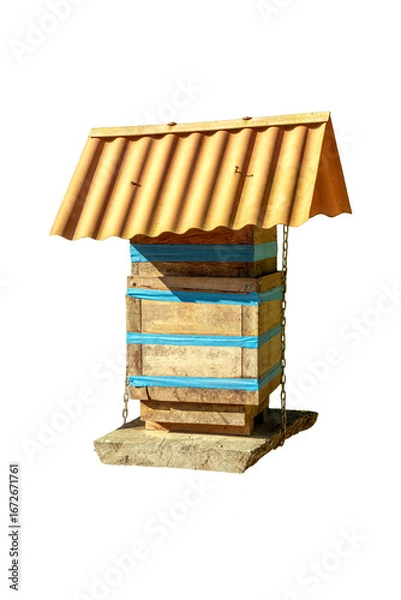 Fototapeta Photograph of a handmade wooden hive box for native bees. Sunny day. Concept of biodiversity preservation and ecology. Essential pollinators.