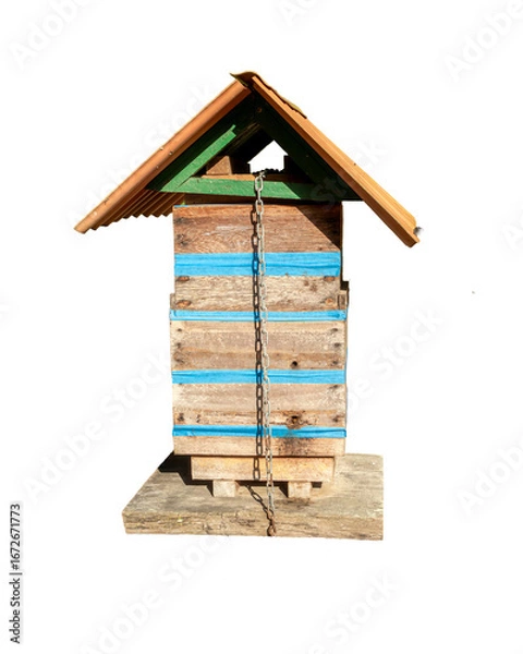 Fototapeta Photograph of a handmade wooden hive box for native bees. Sunny day. Concept of biodiversity preservation and ecology. Essential pollinators.