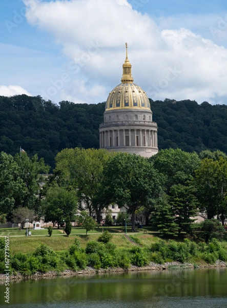 Fototapeta A view of the state capital building in Charleston, West Virginia, USA from across the Kanawha River. 