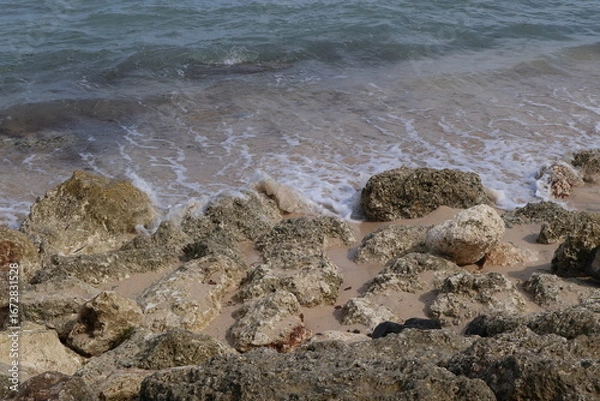 Fototapeta surface texture of large wave breaker rocks