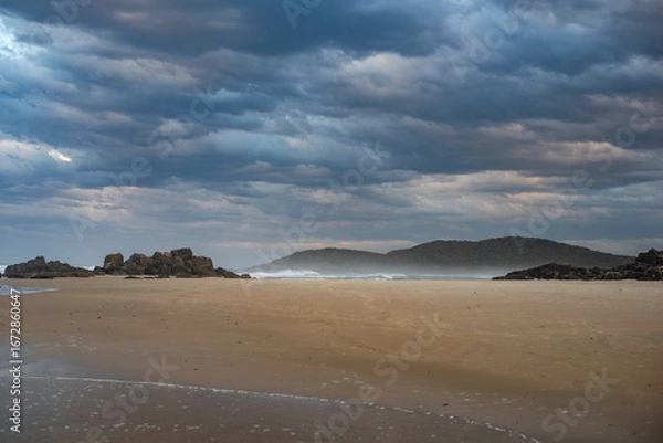 Fototapeta Sunset over Delicate Nobby Beach