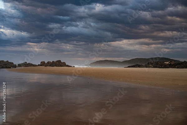Fototapeta Sunset over Delicate Nobby Beach
