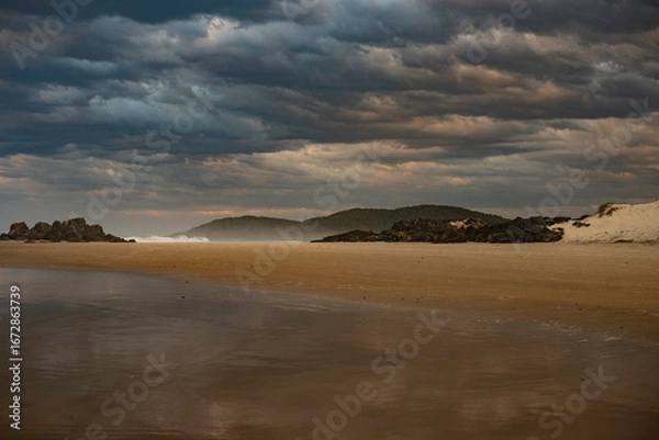 Fototapeta Sunset over Delicate Nobby Beach