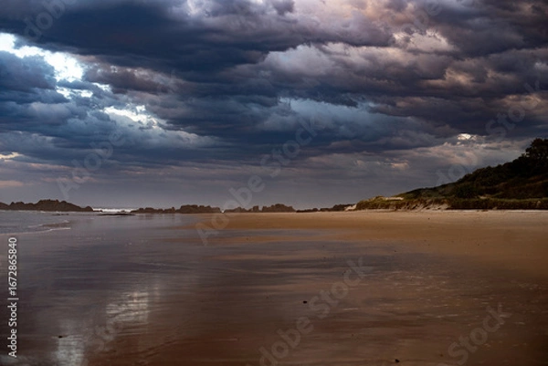 Fototapeta Sunset over Delicate Nobby Beach