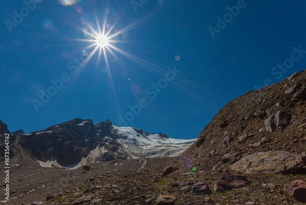 Fototapeta Summer view of the Barba d'Orso glacier surface in a sunny day, Vallelunga, Alto Adige - Sudtirol, Italy. Popular mountain for climbers