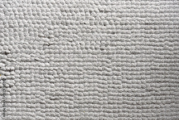 Obraz Close-up of a textured gray rug.