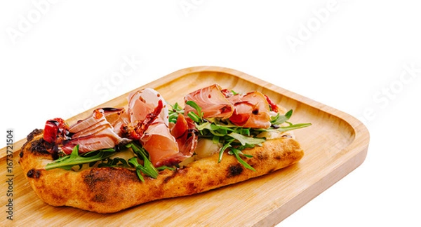 Fototapeta Flatbread topped with fresh greens and cured meat, in a modern style